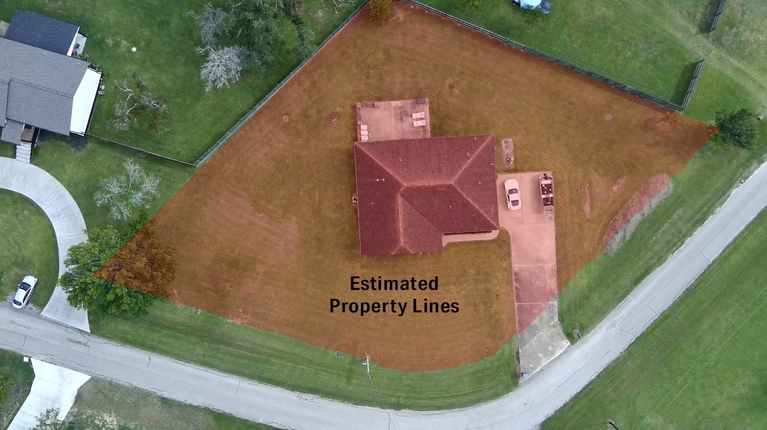 Aerial drone view with estimated property lines highlighted